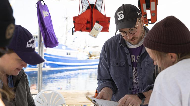 Researchers from UW survey fishermen at the Fishermen Safety Fair at Fishermen’s Terminal I Seattle, WA.