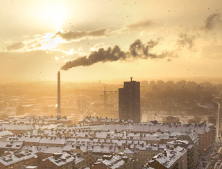 factory blowing smoke