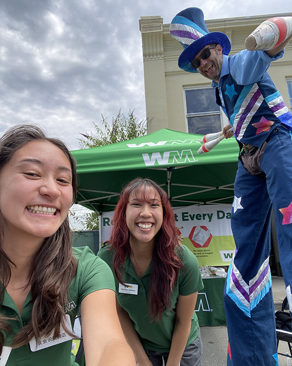 With man on stilts at a fair