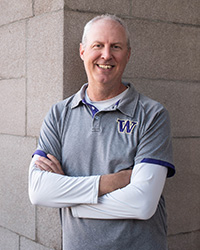 Older man smiling at camera