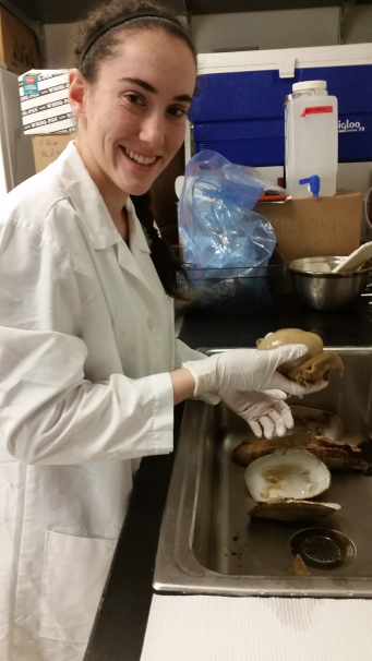 MPH student Tori Balta analyzed geoducks for bacteria; Photo @ Alex Kossik