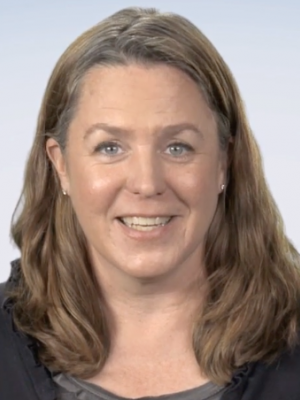 Headshot of Anne Riederer, a middle-aged white woman with light brown hair