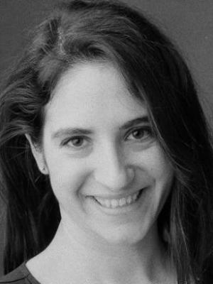 Headshot of Julianne Meisner, a young white woman with long dark hair