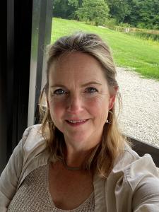 Headshot of Jennifer Lincoln, a middle-aged white woman with blond hair