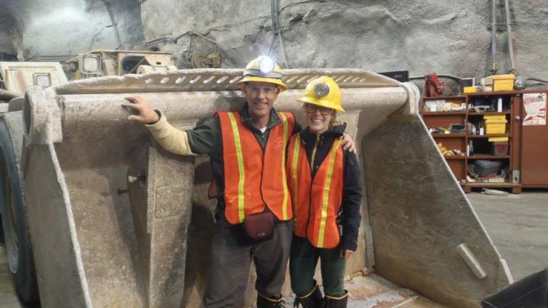 Two workers on site in a mine