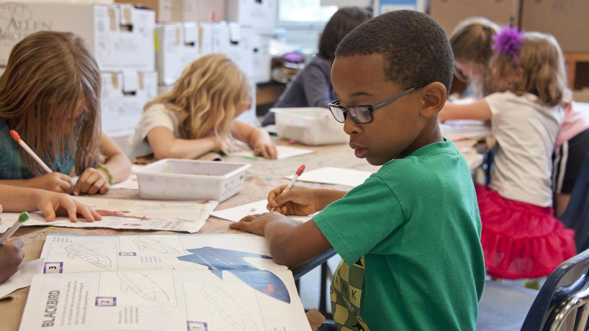 boy working at school