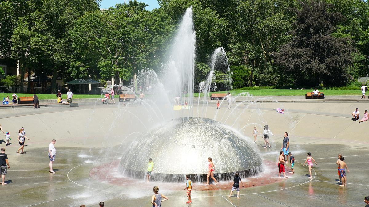 Kids playing in a fountain