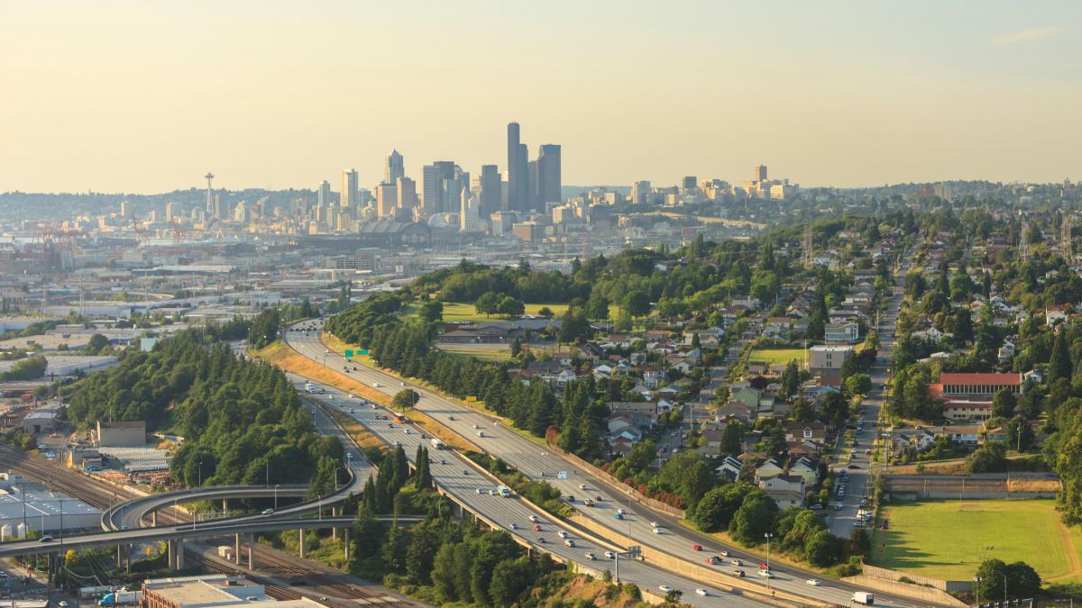 Photo of downtown Seattle, I-5 and surrounding neighborhoods on a smoky day.