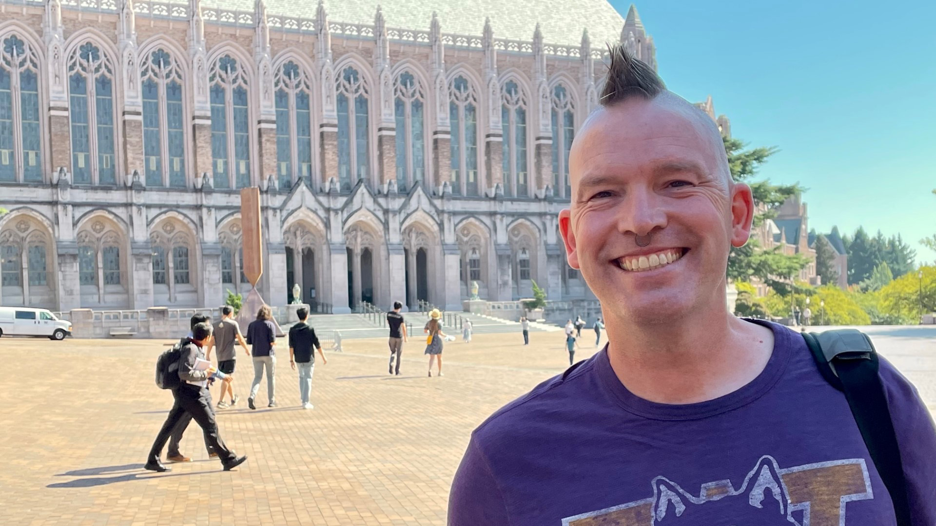 Lykins stands in front of Suzzalo Library on the UW campus.